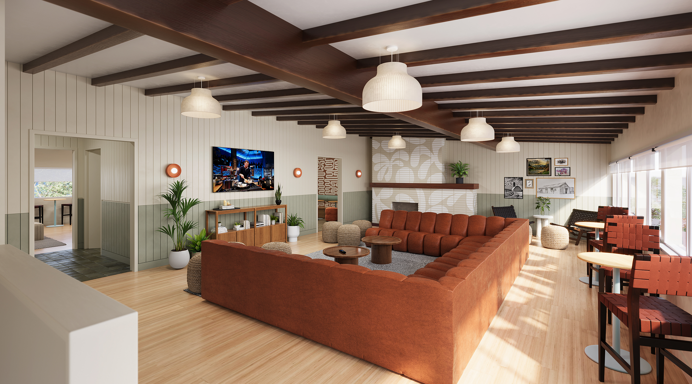 A lounge area with an orange couch